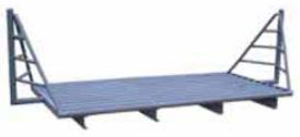 A cattle guard with wings attached to each end for the fence to connect.